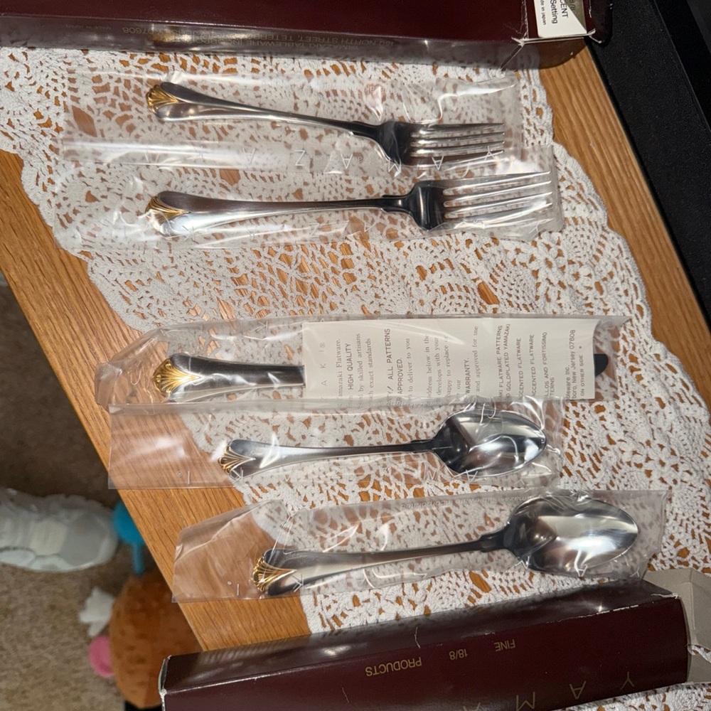 Elegant Silver and Gold Flatware Set